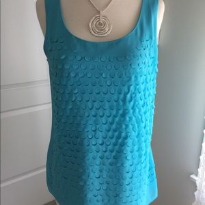Tank shaped with scoop neck.